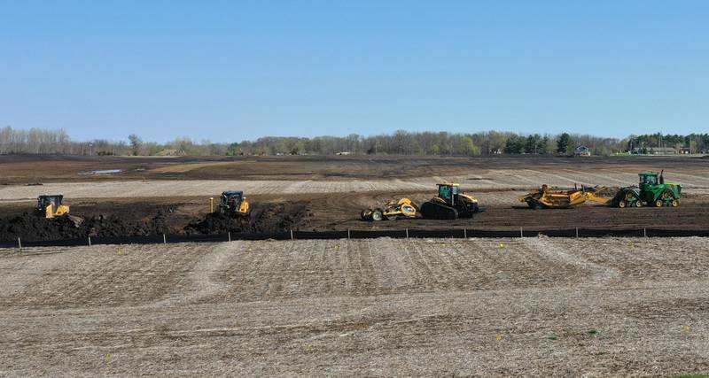 Excavators move dirt at the site of the future Ollie's Bargain Outlet warehouse distribution center on Tuesday, April 18, 2023 just to the north of the intersection of Illinois Route 26 and Progress Drive in Princeton. The 600,000 square-foot facility will be built on 130 acres and create more than 145 jobs. The project is expected to cost 68 million.s