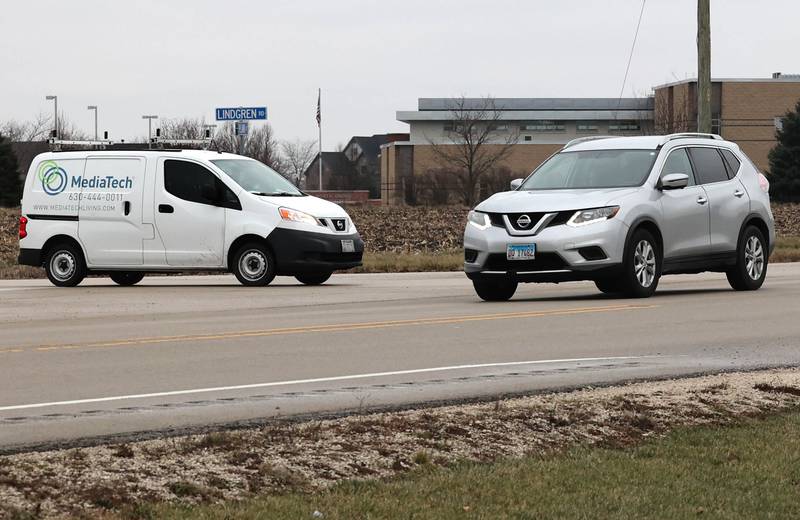Vehicles travel through the intersection at Plank Road, North Grove Road and Lindgren Road Wednesday, Jan. 3, 2024, in Sycamore. A roundabout is planned for the intersection near North Grove Elementary School.