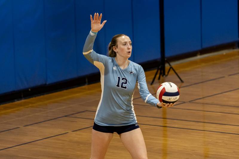 Plainfield South's Riley Kulik serves during a varsity volleyball away game against Joliet Central on Sept. 18, 2025.