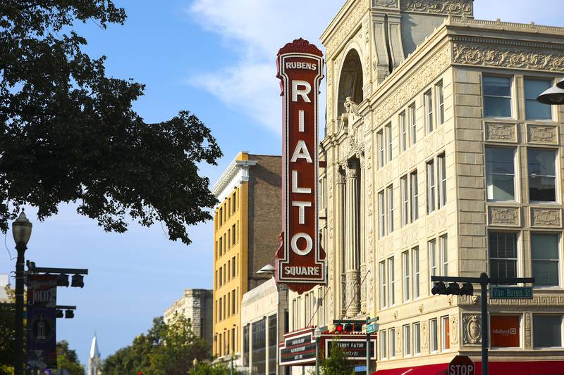 The sun sets over the Rialto Square Theatre on Tuesday, Aug. 31, 2021, in Joliet, Ill.