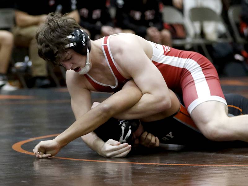 Huntley’s Lucas Bittman controls McHenry’s Nelson Rodriguez during the 175-pound match of a Fox Valley Conference boys wrestling match Thursday, Jan. 11, 2024, at McHenry High School.