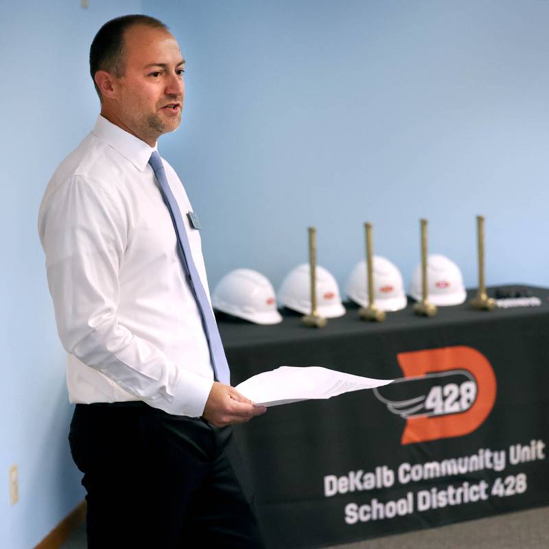 Kyle Gerdes, director of student services for DeKalb School District 428, talks about the plans for the new transition program facility Friday, Aug. 9, 2024, as the ceremonial demolition hammers wait to be used during the Beyond One Barb Transition Center Construction Kick-Off event at the new site at 530 Charter St. in DeKalb.
