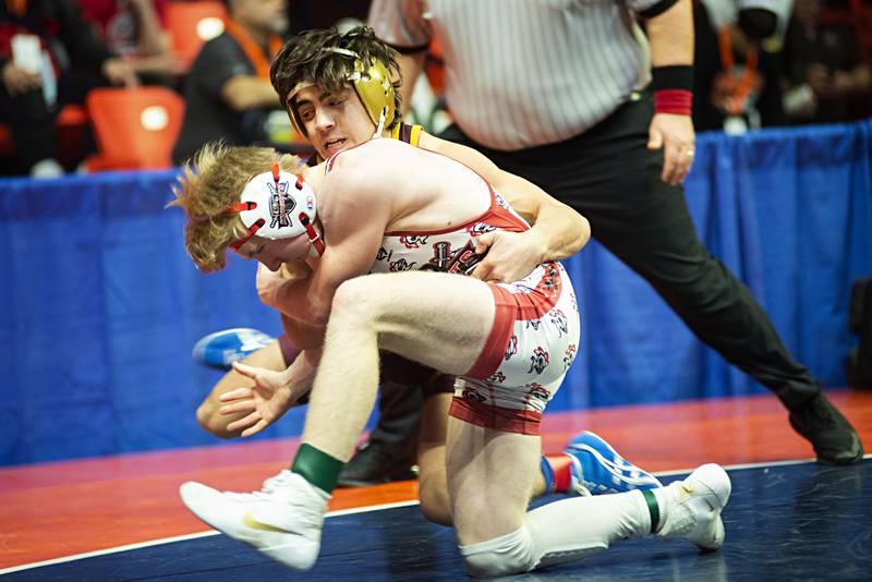 Joey Malito (front) of Lincolnway Central wrestles Massey Odiotti of Loyola in the 120lbs 3A semis.