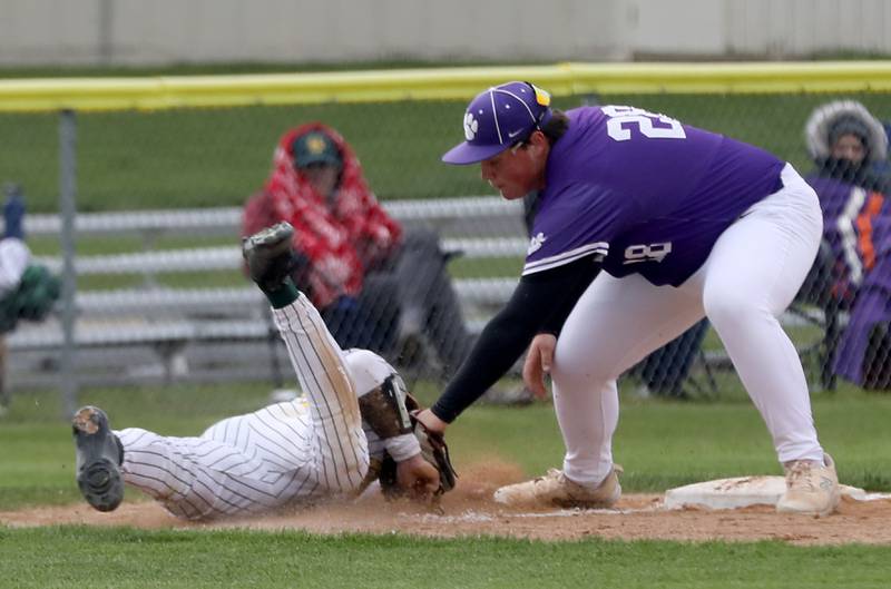 Crystal Lake South's Carson Trivellini is stages out by Hampshire's Logan Nawrocki at third base during a Fox Valley Conference baseball game on Monday, April 29, 2026, at Crystal Lake South High School.