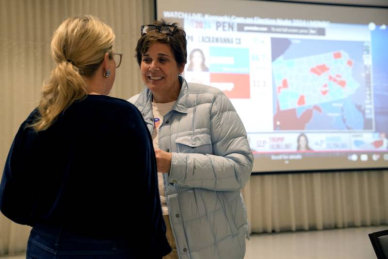 Will County Executive Jennifer Bertino-Tarrant, right, and Erin Gallagher are seen at the Democratic watch party at IBEW Local 176 hall on Tuesday Nov. 5, 2024 in Joliet, Ill.