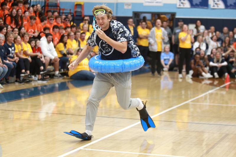 Nazareth senior Richard Holly participates in a relay race on Friday, Sept. 27, 2024 during the La Grange Park school’s annual Homecoming Pep Rally.