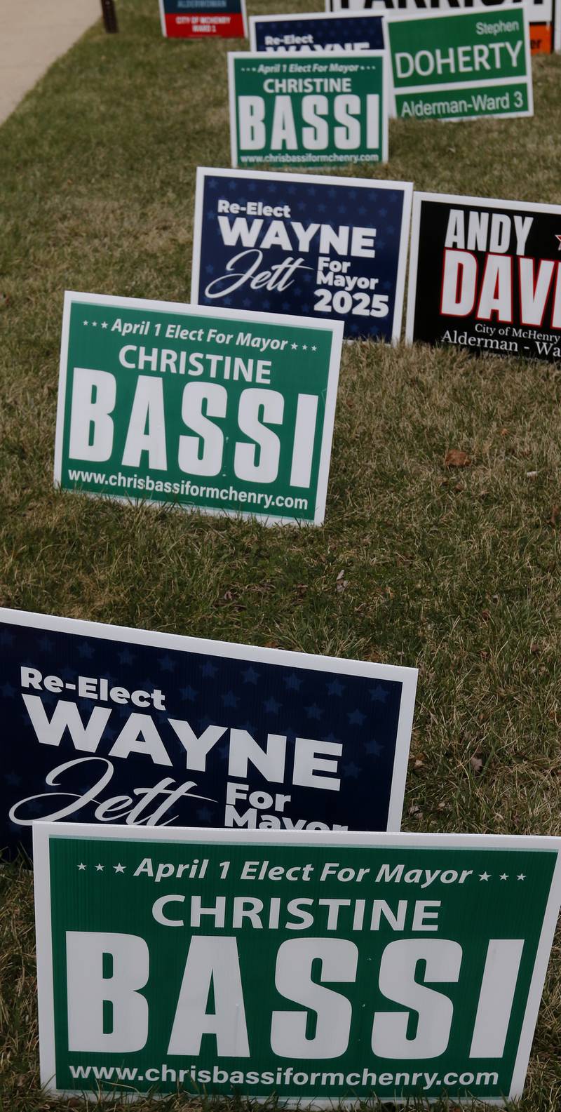 Campaign signs for the mayor’s race on Tuesday, April 1, 2025. outside McHenry City Hall.