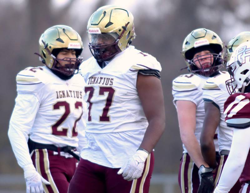 St. Ignatius’ Justin Scott prepares for a play in Class 6A football playoff semifinal action at Crystal Lake on Saturday.