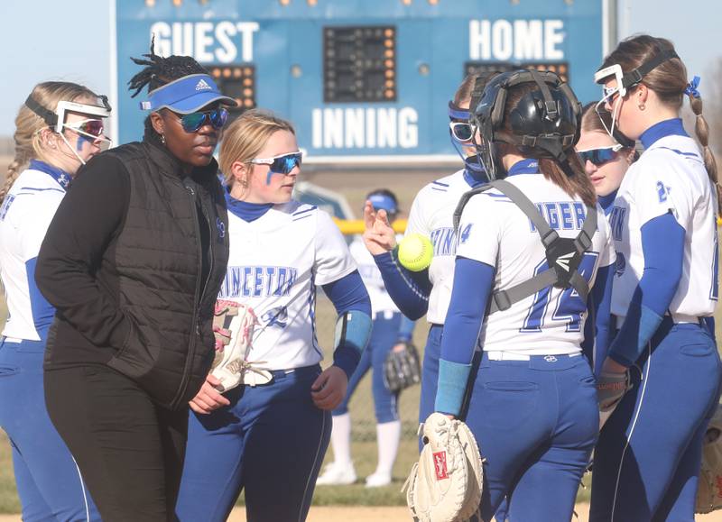 Princeton head softball coach Jhavon Hayes talks to her team while play L-P on Tuesday, March 19, 2024 in Princeton.