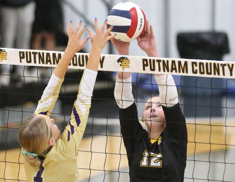Putnam County's Chloe Parcher pushes the ball across the net past Serena's Emily Hoffman on Monday, Sept. 22, 2025 at Putnam County High School.