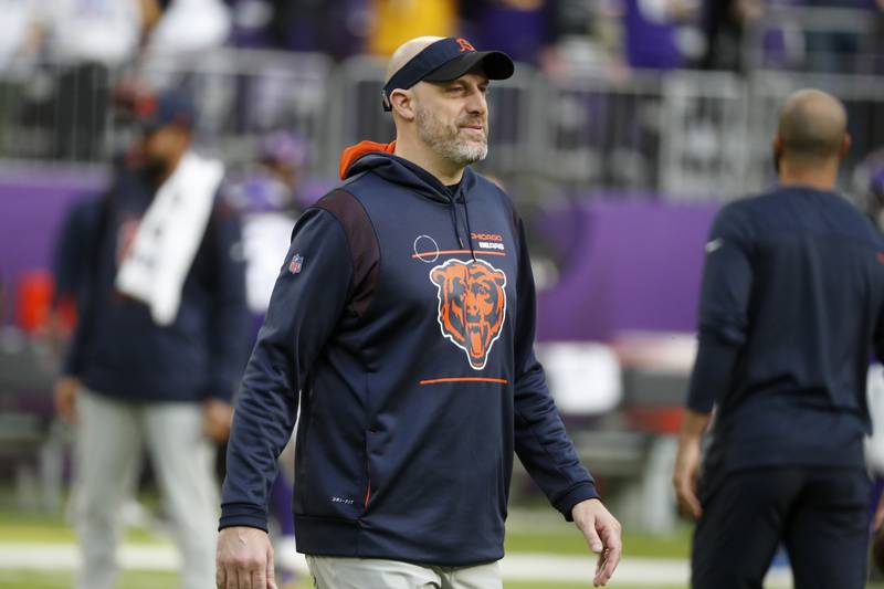 Chicago Bears head coach Matt Nagy walks on the field before facing the Minnesota Vikings, Sunday, Jan. 9, 2022, in Minneapolis.