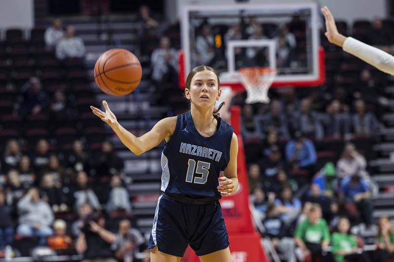 Nazareth Academy’s Mary Bridget Wilson takes a pass against Waubonsie Valley Friday, March 1, 2024 in the girls basketball 4A state semifinal at CEFCU Arena in Normal.