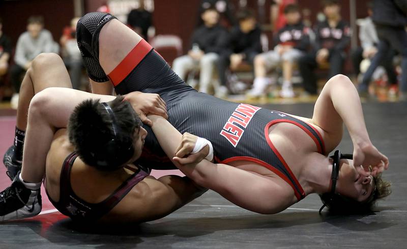Prairie Ridge’s Aiden Rodriguez pins Huntley’s Ajdin Ahmedi during the 175-pound match of a Fox Valley Conference boys wrestling meet on Thursday, Jan. 22, 2026, at Prairie Ridge High School Crystal Lake.