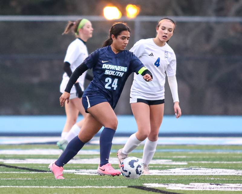 Downers Grove South's Marifer Duran (24) handles the ball during soccer match between Riverside-Brookfield at Downers Grove South.  April 10, 2025.