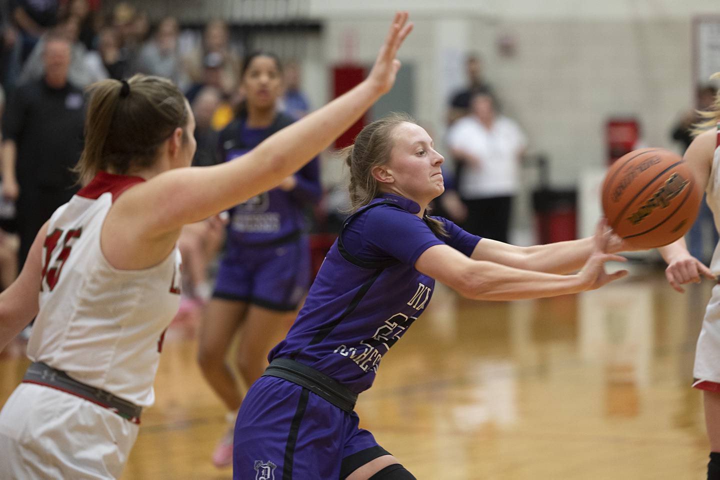 Dixon’s Katie Drew makes a pass against Lincoln in the class 3A super sectional Monday, Feb. 26, 2024 at LaSalle-Peru High School.