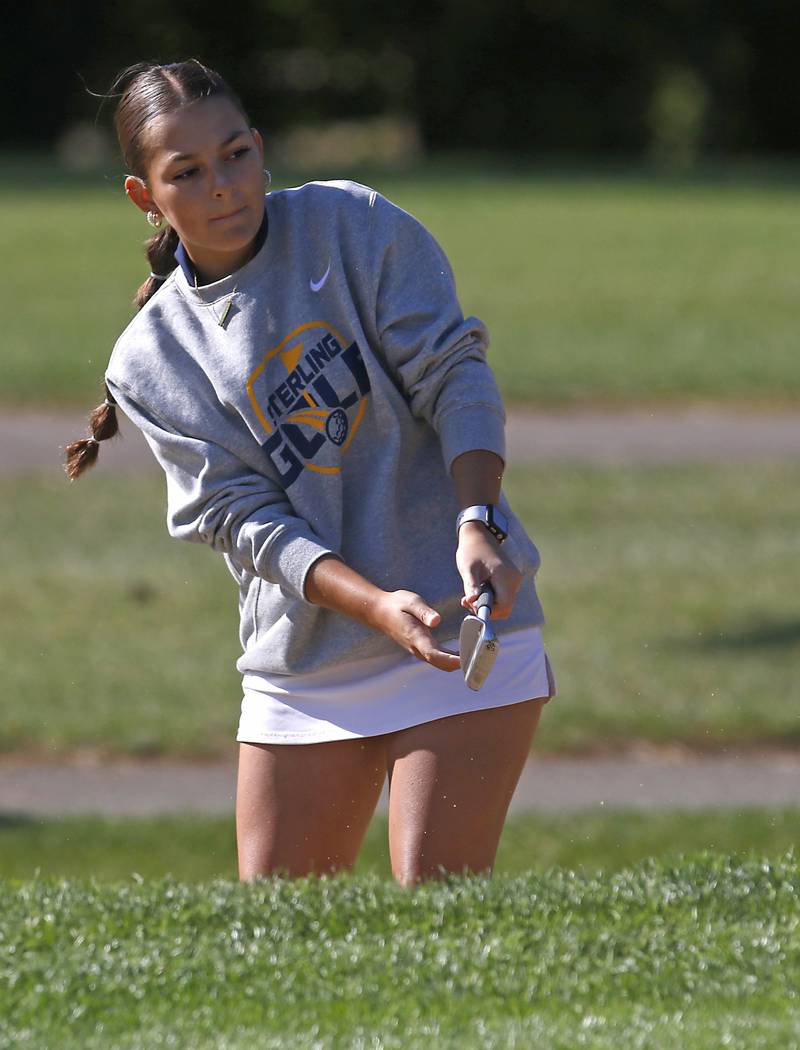 Sterling’s Deyanie Alfaro hits out of the sand trap on the second hole during the IHSA Class 2A Huntley Girls Golf Regional on Tuesday, Oct. 1, 2024, at Pinecrest Golf Club in Huntley.