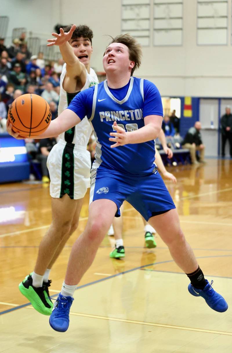 Princeton's Jordan Reinhardt takes a scoop shot in Friday's regional finals at Prouty Gym. The Tigers won 59-53.
