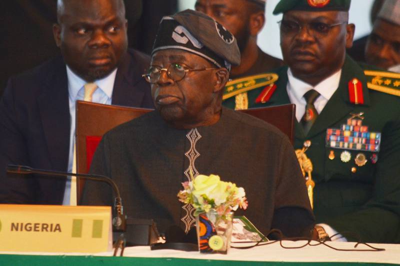 FILE - Nigerian President Bola Ahmed Tinubu attends an ECOWAS meeting in Abuja, Nigeria, Sunday, June 22, 2025. (AP Photo/Olamikan Gbemiga, File)