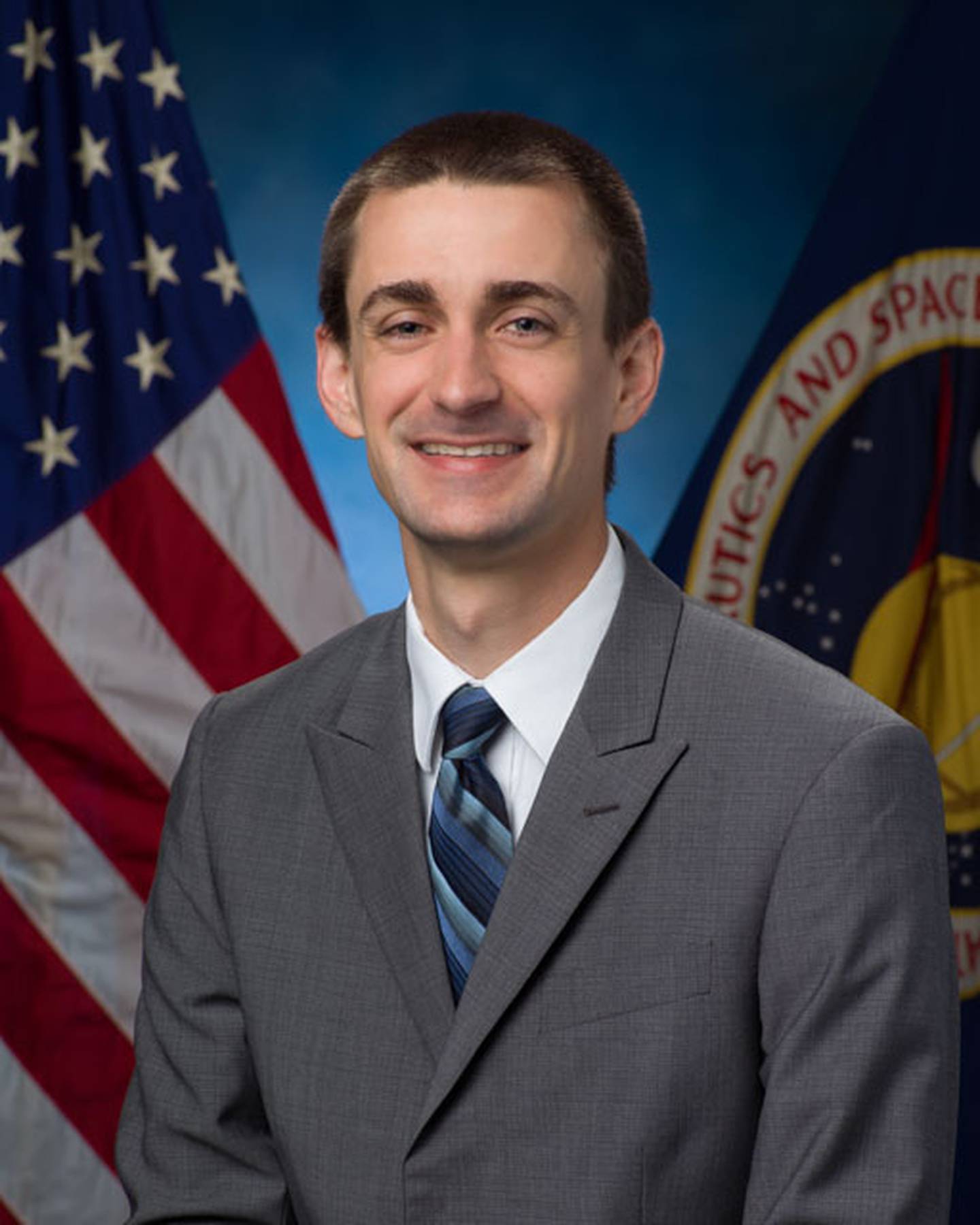 Official NASA Portrait of ISS Flight Controller Christopher T. Dobbins, formerly of Crystal Lake, taken April 5, 2022.