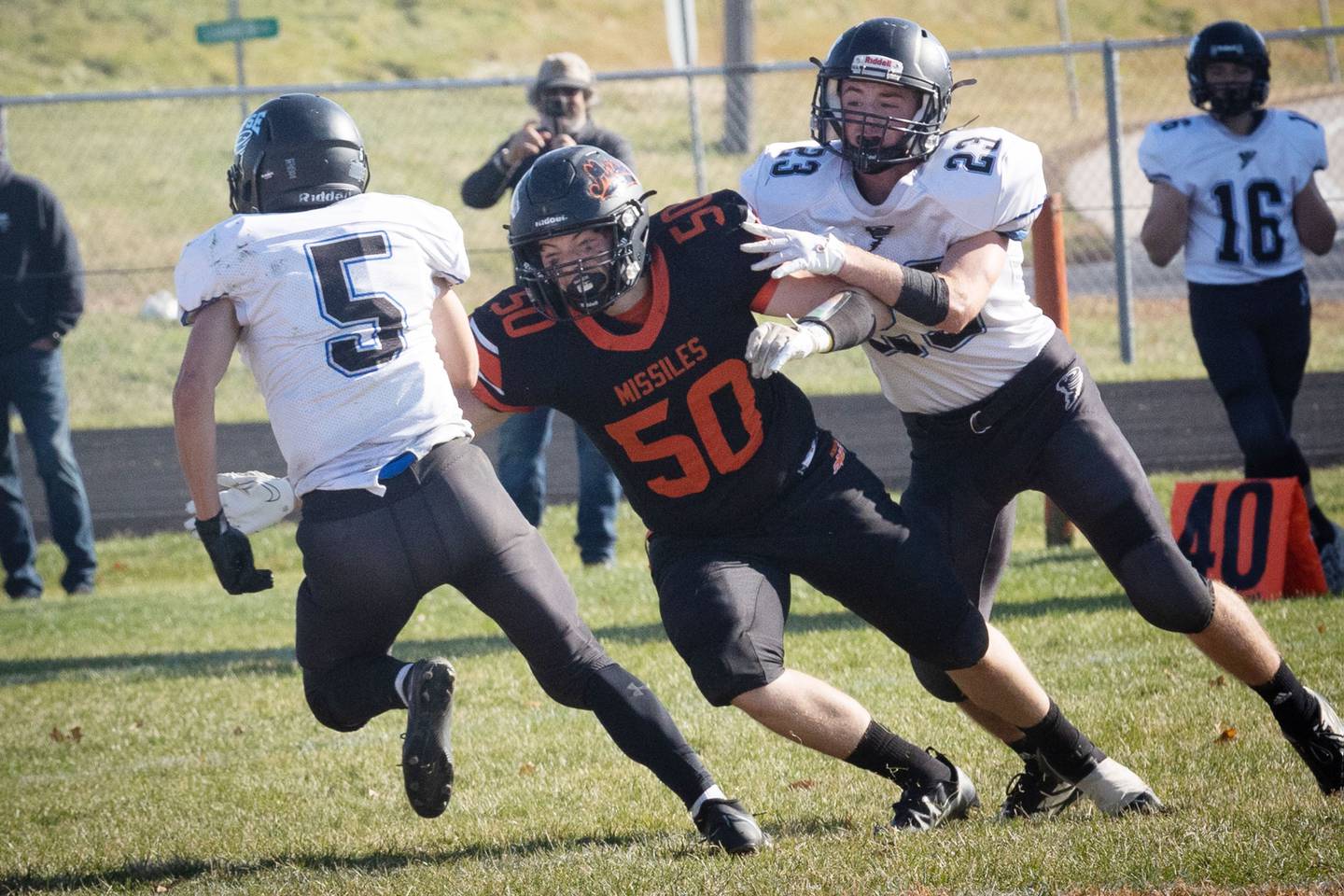 Millledgeville's Cayden Akers blocks west Prairie's Jensen Laughlin Saturday, October 29th in the Missiles first round playoff game against the West Prairie Cyclones.