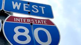 Driver injured after semi-truck rolls over on I-80 near Minooka