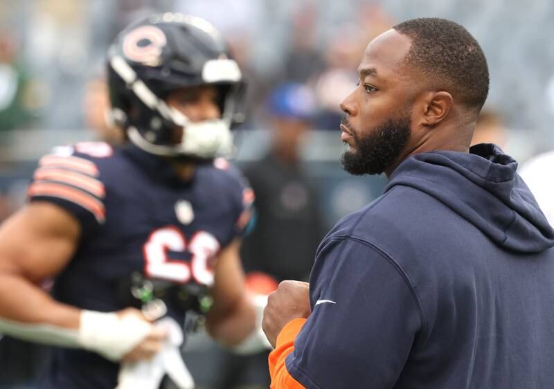 New Chicago Bears offensive coordinator Thomas Brown watches players go through their warmups before the Bears play the Packers Sunday, Nov. 17, 2024, at Soldier Field in Chicago.