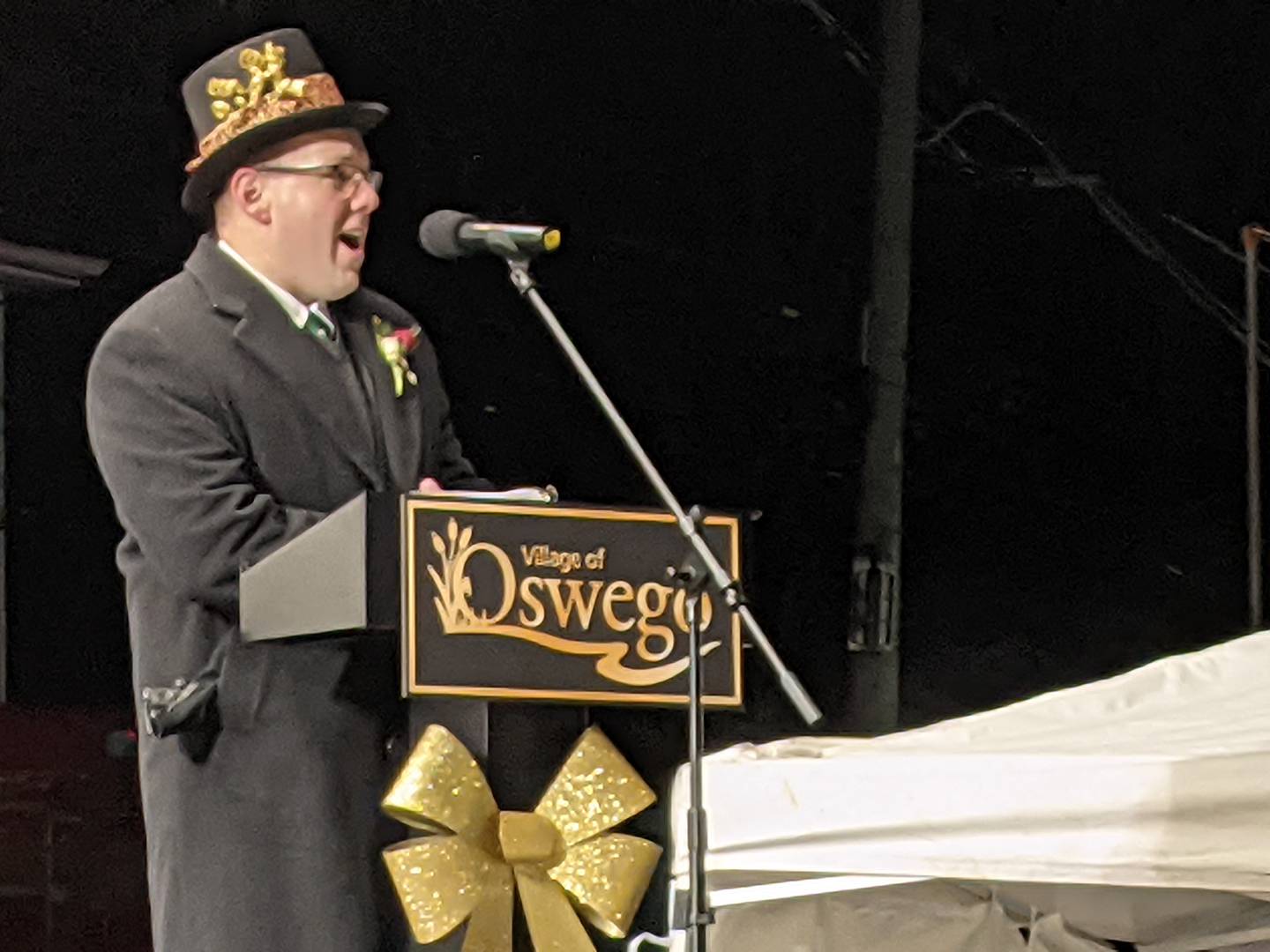 Oswego Village President Ryan Kaufman welcomes the crowd at Oswego Christmas Walk on Dec. 6.