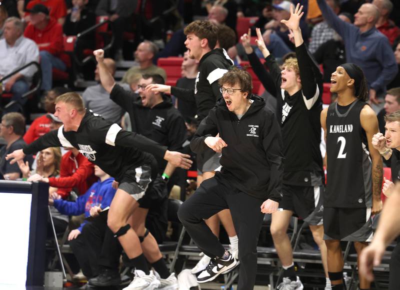 Kaneland players celebrate their win over Morton Monday, March 9, 2026, after their IHSA Class 3A supersectional matchup in the Convocation Center at Northern Illinois University in DeKalb.