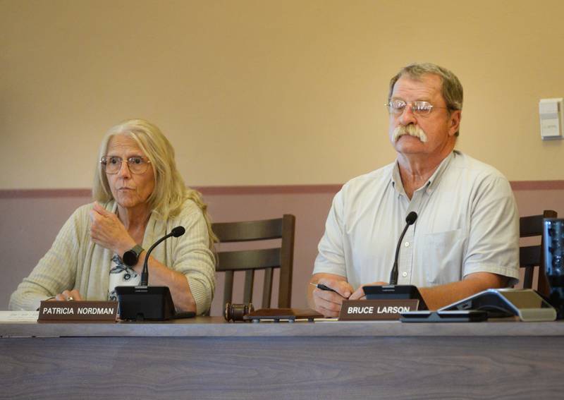 Ogle County Board Chairman Bruce Larson and Vice Chair Pat Nordman listen during the public comment period at  the Tuesday, July 15, 2025, county board meeting in Oregon.