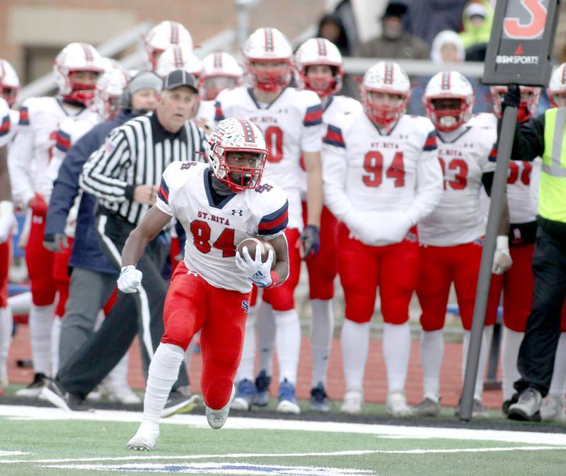 St. Rita's Ethan Middleton (84) runs the ball during their 7A quarterfinal game against St. Charles North in St. Charles on Saturday, Nov. 12, 2022.