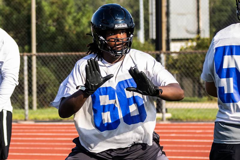 Mason Halliman participates in varsity football practice at Lincoln-Way East on Aug. 11, 2025.