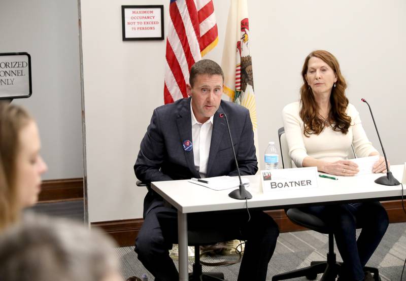Nicolas Boatner (left), candidate for Campton Hills trustee, answers a question as candidate Janet Burson looks on during a candidates’ forum hosted by the League of Women Voters at the Campton Hills Village Hall on Thursday, March 2, 2023.