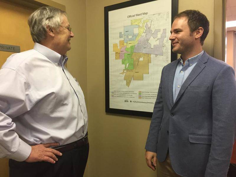 DeKalb mayor Jerry Smith (left) and Jason Michnick (right), economic development planner for the city, talk after the Joint Review Board meeting Friday at the DeKalb Municipal Building, 200 S. Fourth St., was continued to a month from now. The talks come from concerns about the proposed new tax increment financing district in DeKalb, including the city's past use of TIF funds and previous TIF-funded projects being included in the proposed new TIF district.