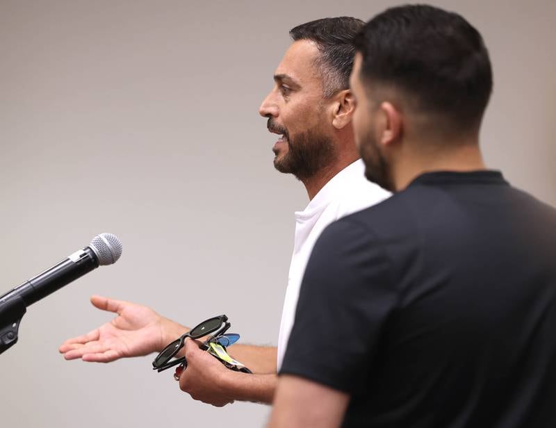 Public commenters talk Monday, June 23, 2025, about how amending the city code to prohibit the sale of illicit THC products and kratom within DeKalb would hurt small businesses during the city council meeting at the DeKalb Public Library.