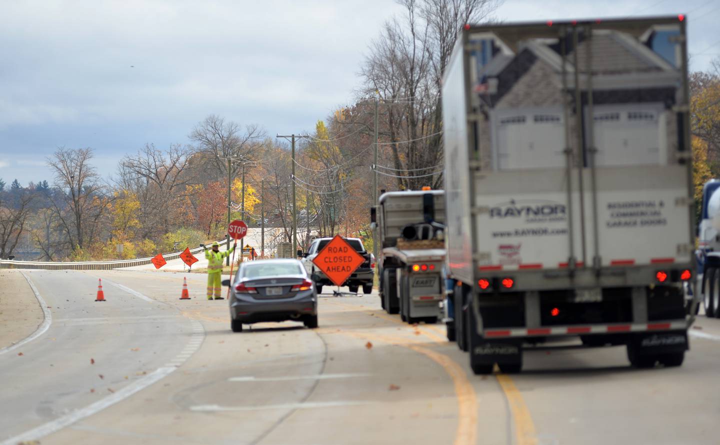Southbound traffic was backed up on Illinois 2 near Oregon after a large tree fell across the state highway on Thursday, Oct. 31, 2024. The road was closed from Fair Street in Oregon north to Margaret Fuller Drive as crews waited for a crane to arrive to remove the tree. Electricity was knocked out for some residents north of Oregon.