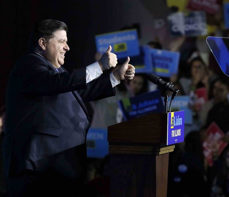 Gov. J.B. Pritzker gives a thumbs up before his speaks on election night Tuesday November 8, 2022 in the in the Great Lakes Ballroom at the Marriott Marquis in Chicago.