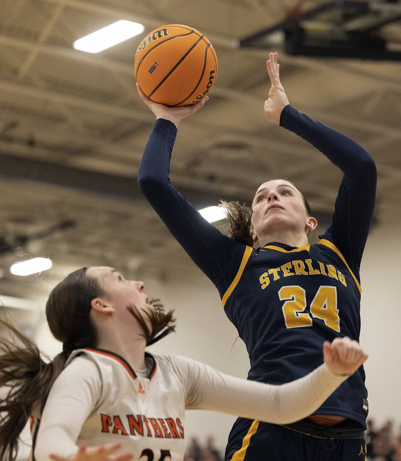 Sterling’s Madison Austin puts up a shot late in the game against Washington Monday, March 3, 2025, during the 3A Supersectional at Rochelle High School.
