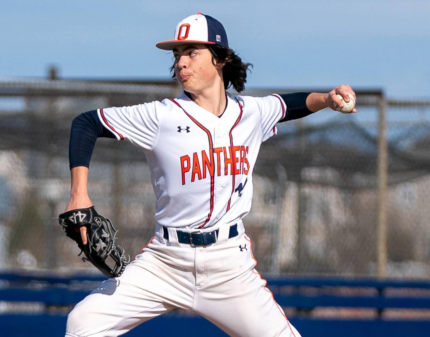 Oswego’s Bryson Mello (12) delivers a pitch against Plainfield South during a baseball game at Oswego High School on Monday, April 11, 2022.
