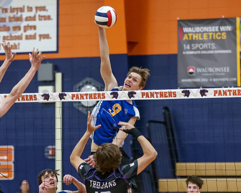 Lyons Leo Wiemelt (9) with a kill during Oswego Sectional final between Downers Grove North at Lyons.  May 30, 2023.