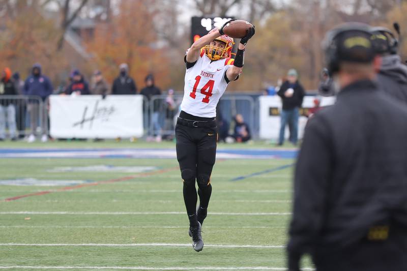 Batavia's Brennon Zeng leaps for the catch against St. Rita in the Class 7A state semifinal on Saturday, Nov. 22, 2025 in Chicago.
