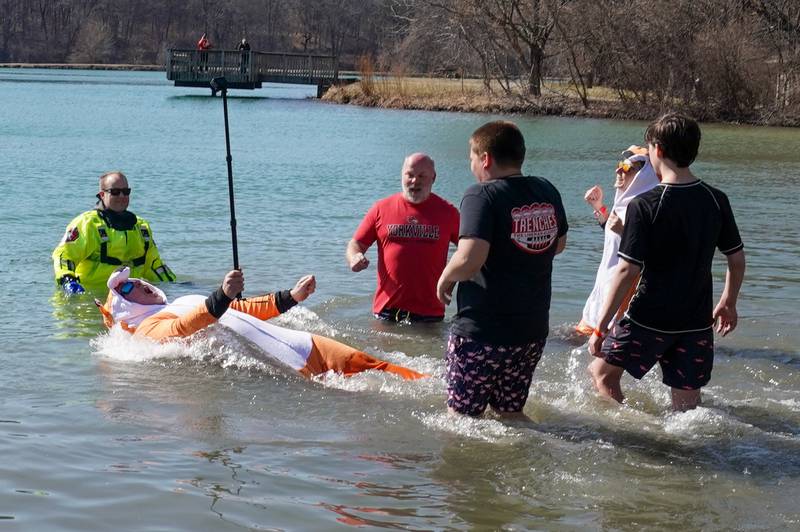 Members of Yorkville School District 115 participate in the polar plunge for special olympics at Silver Springs State Park in Yorkville on Sunday, Mar 3, 2024.