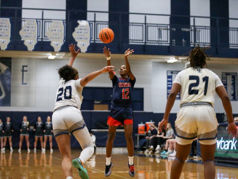 Oswego's Destiny Hicks (12) shoots a jump shot during their basketball game between Oswego at Oswego East, Feb 10, 2026 in Oswego.