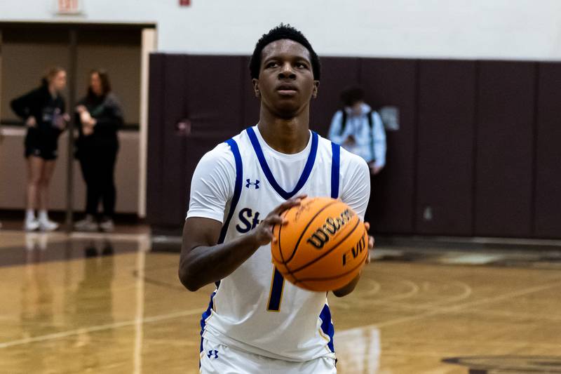 Joliet Central's Bernal Fox shoots a free throw during a WJOL Thanksgiving Classic Boys Basketball game against Lockport at the University of St. Francis’s Pat Sullivan Center in Joliet on Nov. 24, 2025.
