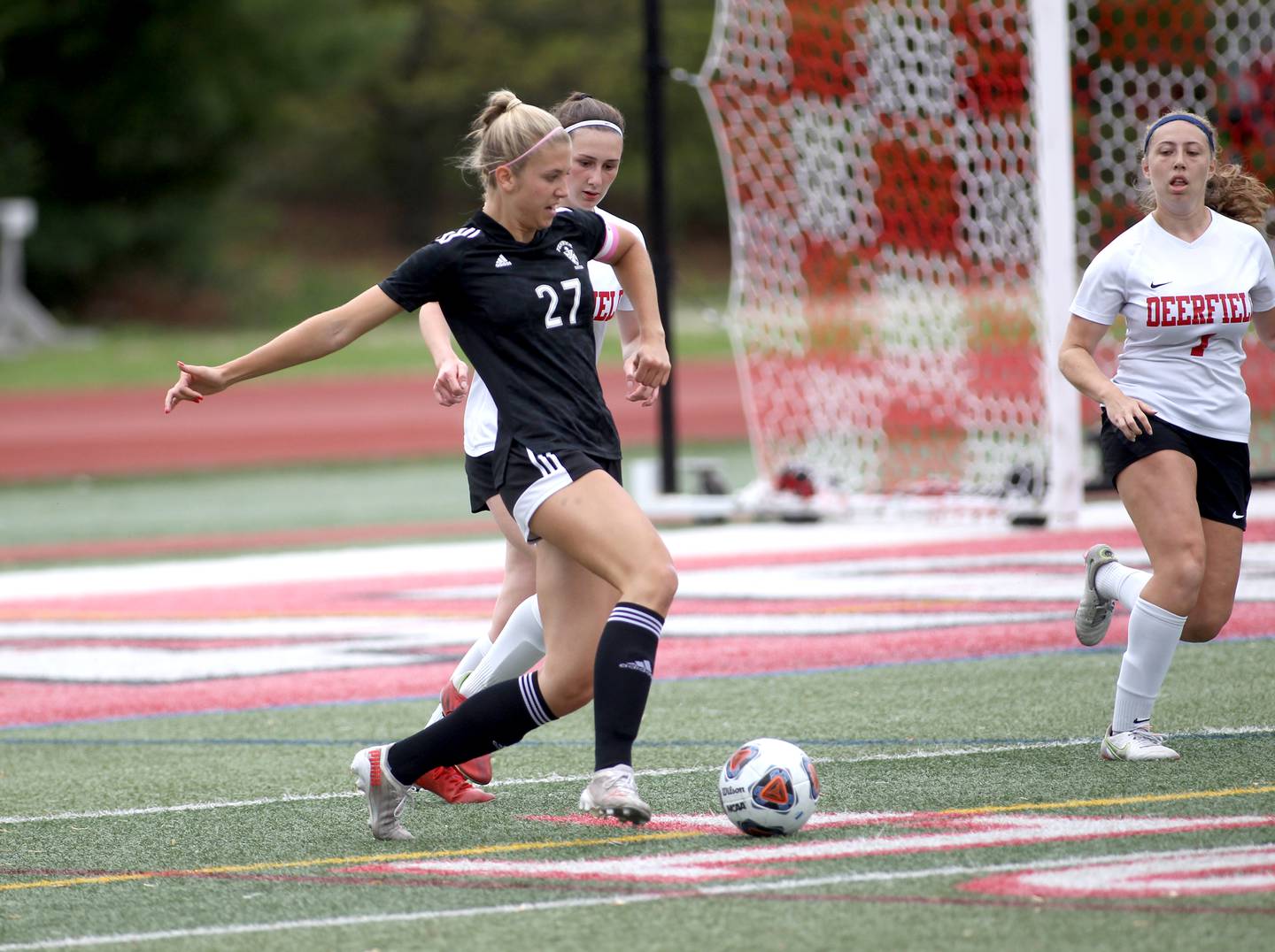 Fenwick’s Kate Henige (27) goes after the ball during their IHSA Class 2A State consolation game against Deerfield at North Central College in Naperville on Saturday, June 4, 2022.