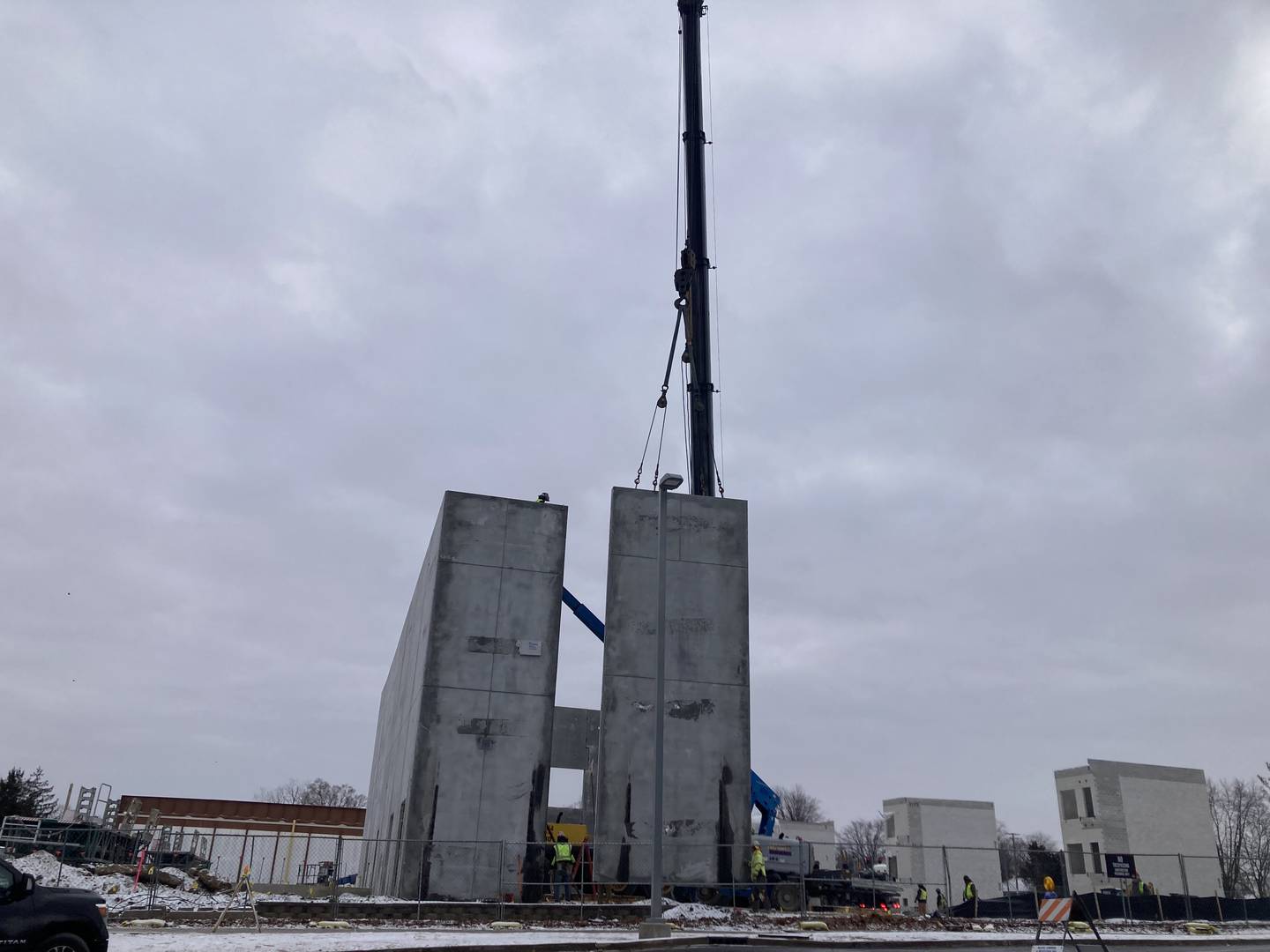 A prefabricated wall piece is installed in the future Gompers Junior High School, 1501 Copperfield Ave., in Joliet on Thursday Jan. 23, 2025.