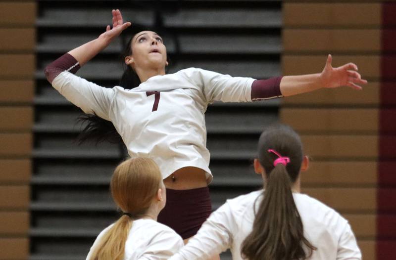 Prairie Ridge’s Maizy Agnello prepares to hammer the ball in varsity girls volleyball at Huntley High School in Huntley on Thursday, Sept. 11, 2025.