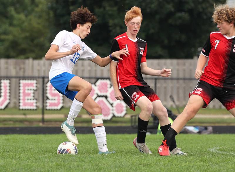 Hinckley-Big Rock's Michael Murphy trees to keep the ball away from Indian Creek's Tyler Bogle during their game Wednesday, Sept. 20, 2023, at Pack Park in Waterman.