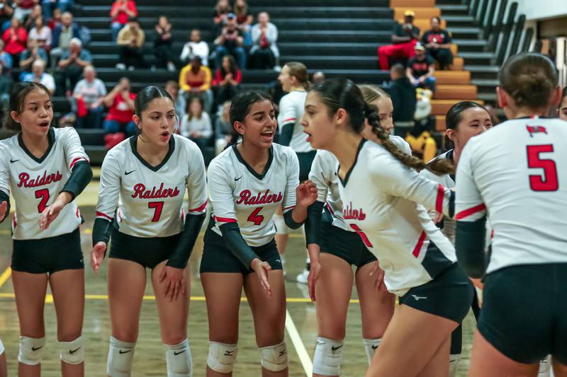 Bolingbrook's Angie Pena (6) is greeted during introductions before their regional final volleyball match between at Joliet West.  Oct 26, 2023.