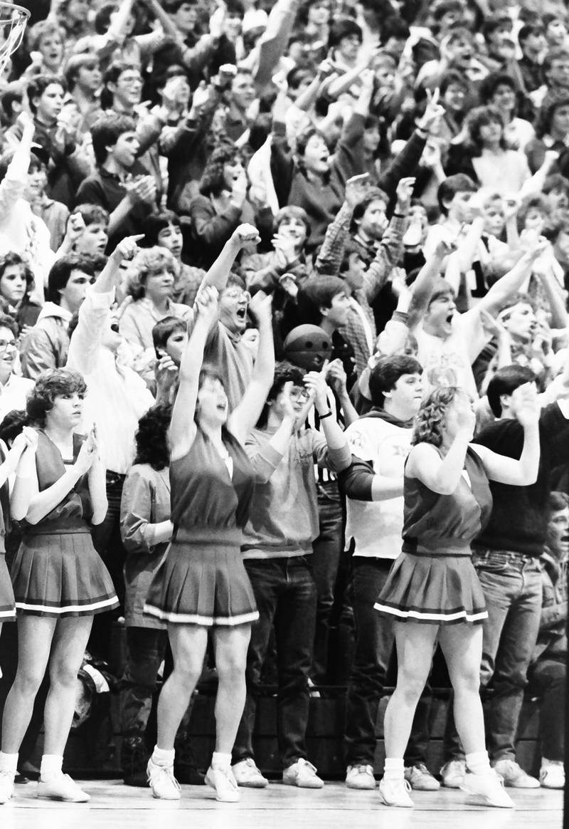 L-P cheerleaders and students cheer during the Regional title game on Saturday, Feb. 28, 1986 at La Salle-Peru Township High School.