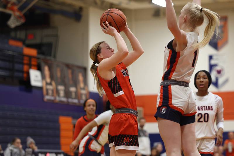 Minooka’s Bree Cook puts up a shot against Romeoville on Tuesday January 24th, 2023.